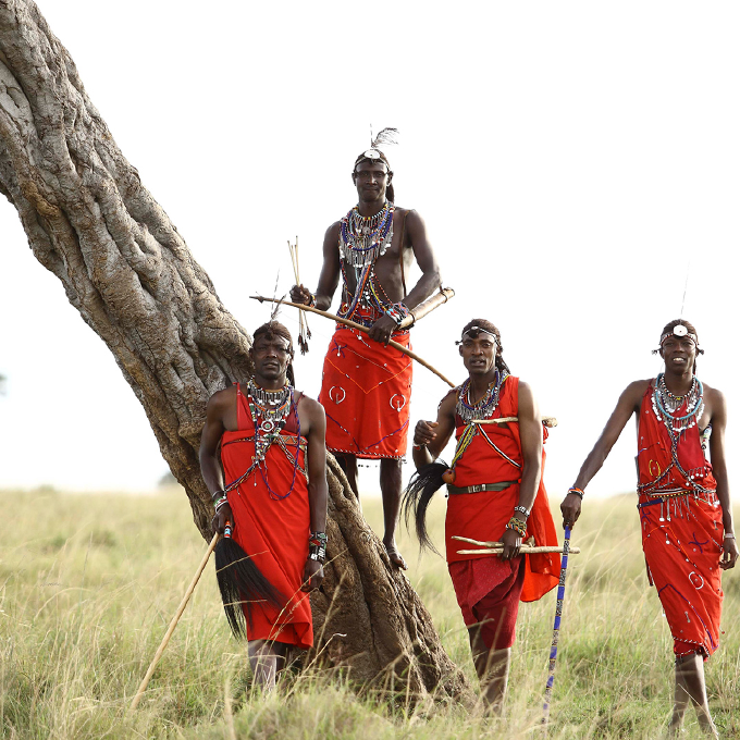 maasai-men-standing-by-a-tree-in-the-masai-mara